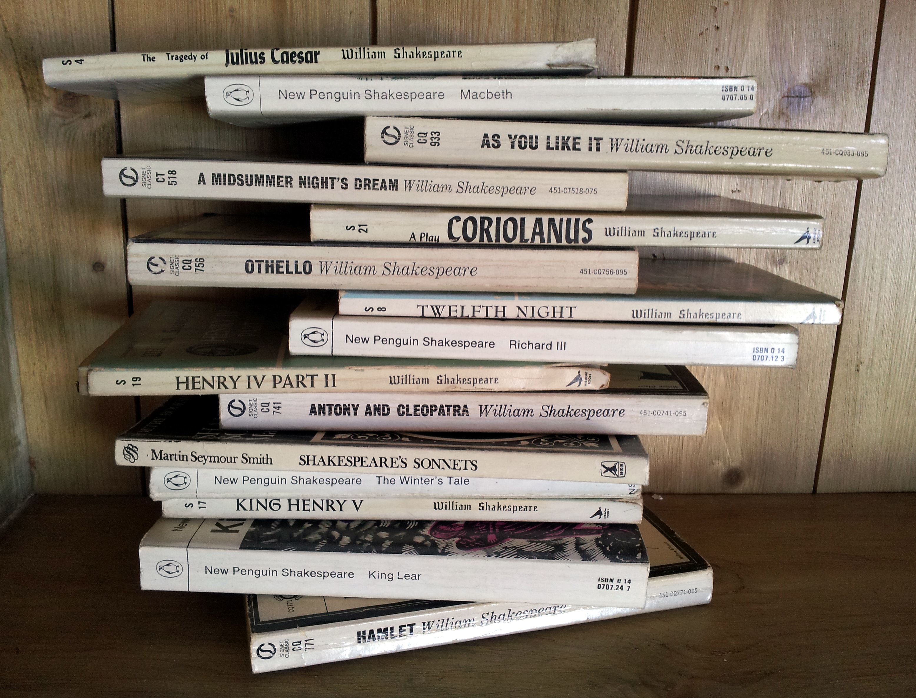 Pile of Shakespeare plays with the spines facing forward.